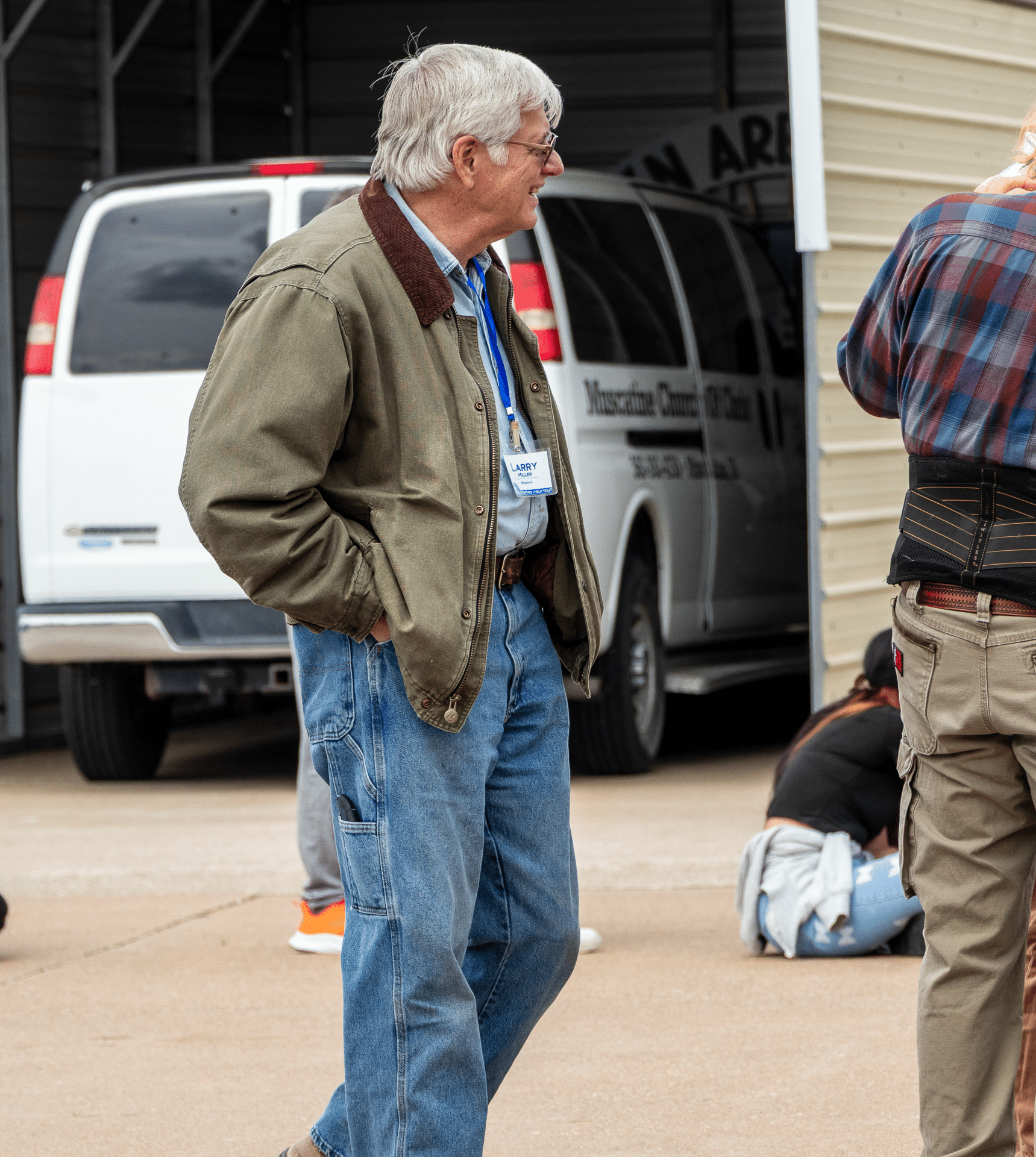 A friendly chat outside church—neighbors coming together, sharing hope and connection in our community. - Muscatine Church of Christ